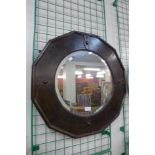 An early 20th Century oak framed dodecagon mirror, 64 x 64cms