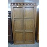 An oak two door press cupboard