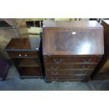 An inlaid mahogany bureau and a small side cabinet