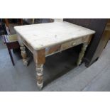 A pine scrub top single drawer kitchen table