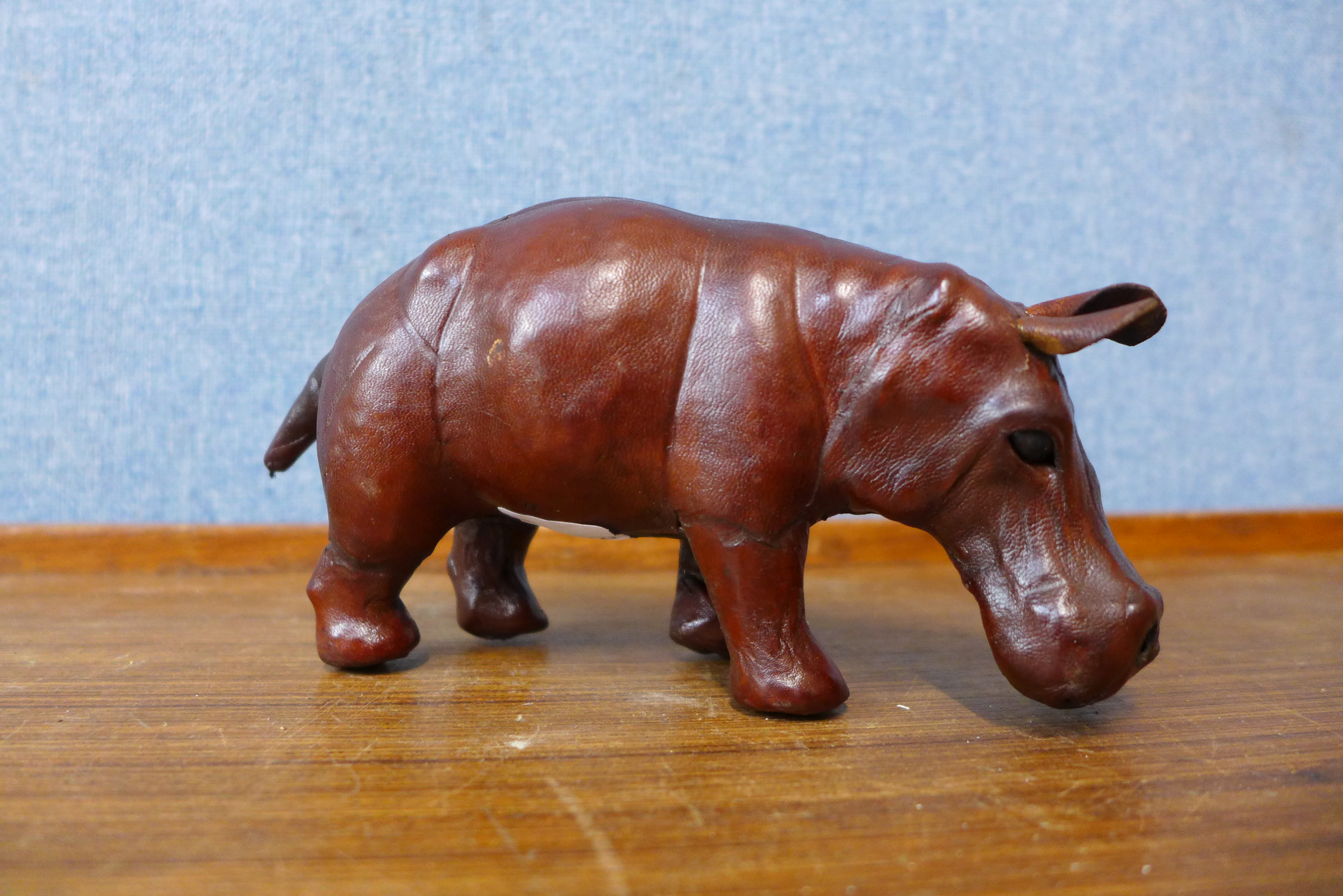 A small brown leather hippopotamus, 9cms h