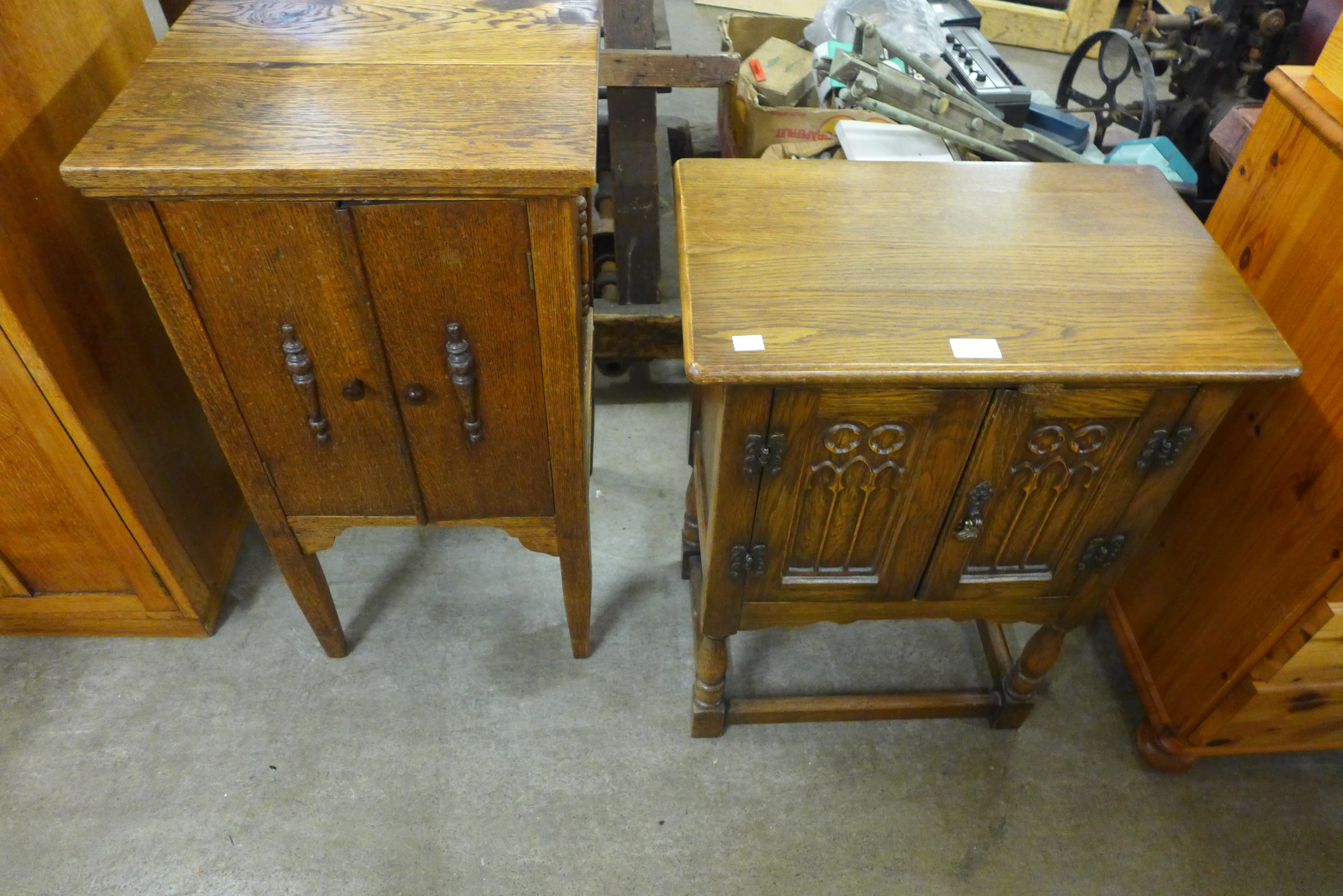 Two small oak two door cabinets