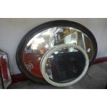 Two oval mirrors