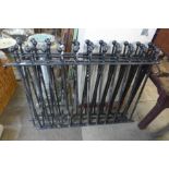 Four pieces of cast iron fence railings