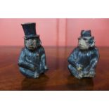 A pair of Austrian cold painted bronze monkey salt and pepperettes, 6.5cms h (one lacking top)