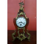 A 19th Century French tortoiseshell and ormolu timepiece, 25cms h