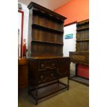 A carved oak barleytwist dresser, 174cms h, 92cms w, 42cms d