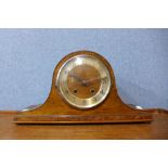 An oak mantel clock, 22cms h