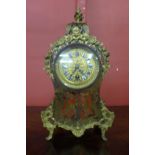 An early 20th Century French Boulle style mantel clock, 32cms h