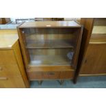 A small teak bookcase