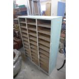 A painted pigeon hole cabinet