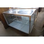 A metal shop cabinet, 89cms h, 122cms w, 61cms d