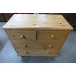 A Victorian style pine chest of drawers