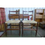 A pair of Danish teak and paper cord seated chairs