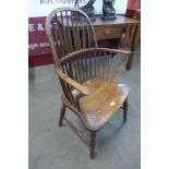 A 19th Century elm and yew Windsor chair, 99cms h x 55cms d