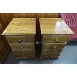 A pair of pine chests of drawers