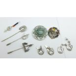 A hallmarked Scottish silver brooch set with moss agate, a hallmarked silver thistle brooch