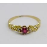 A Victorian ruby and diamond three stone ring, (tests as high carat gold), 1.4g, P