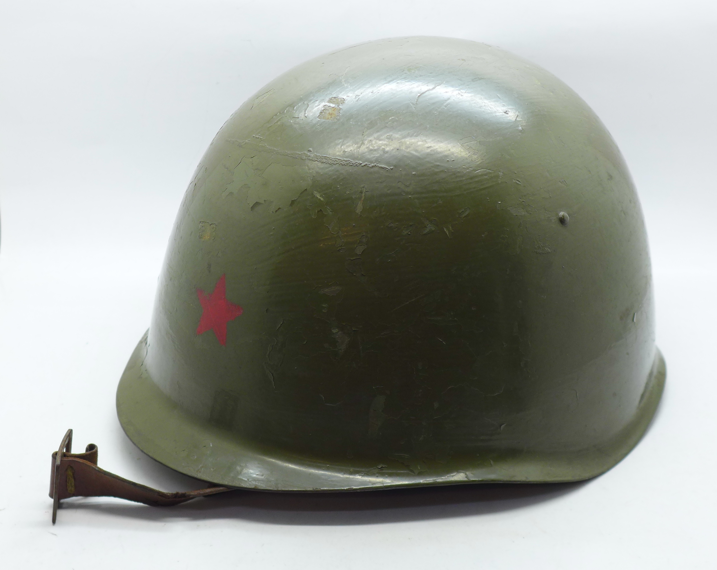 A Czechoslovakian Army helmet painted in Russian colours