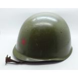 A Czechoslovakian Army helmet painted in Russian colours