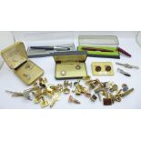 Cufflinks, tie-clips and two Parker pens
