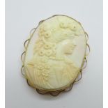 A 9ct gold mounted cameo brooch, total weight 13.6g, carving 43mm x 32mm