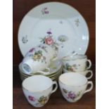 Six Royal Copenhagen cups and saucers, 910/1870 pattern and a similar dinner plate, 910/9785 pattern