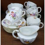 A Royal Crown Derby Derby Posies tea set, six setting with cream and sugar, one additional cup (