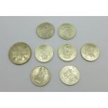 A 1928 florin and seven one shilling coins, 1936, 1938, 3x 1942, 1945 and 1946