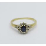 A 9ct gold, diamond and sapphire cluster ring, 1.7g, O