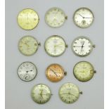 A collection of wristwatch movements, including Smiths, Bernex, Waltham, etc.