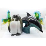 Two Murano glass models horses, a Poole dolphin and a penguin figure