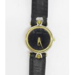 A lady's Gucci wristwatch, (case and glass scratched)