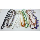 Eleven glass/crystal costume necklaces