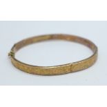 A hallmarked 9ct gold bangle, Birmingham 1900, 5.6g, a/f dented