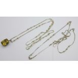 Two silver chains and a citrine coloured pendant, each chain 90cm