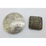 An 833 silver compact and an 800 silver filigree box