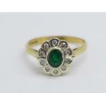 A 9ct gold, emerald and diamond cluster ring, 2.2g, M