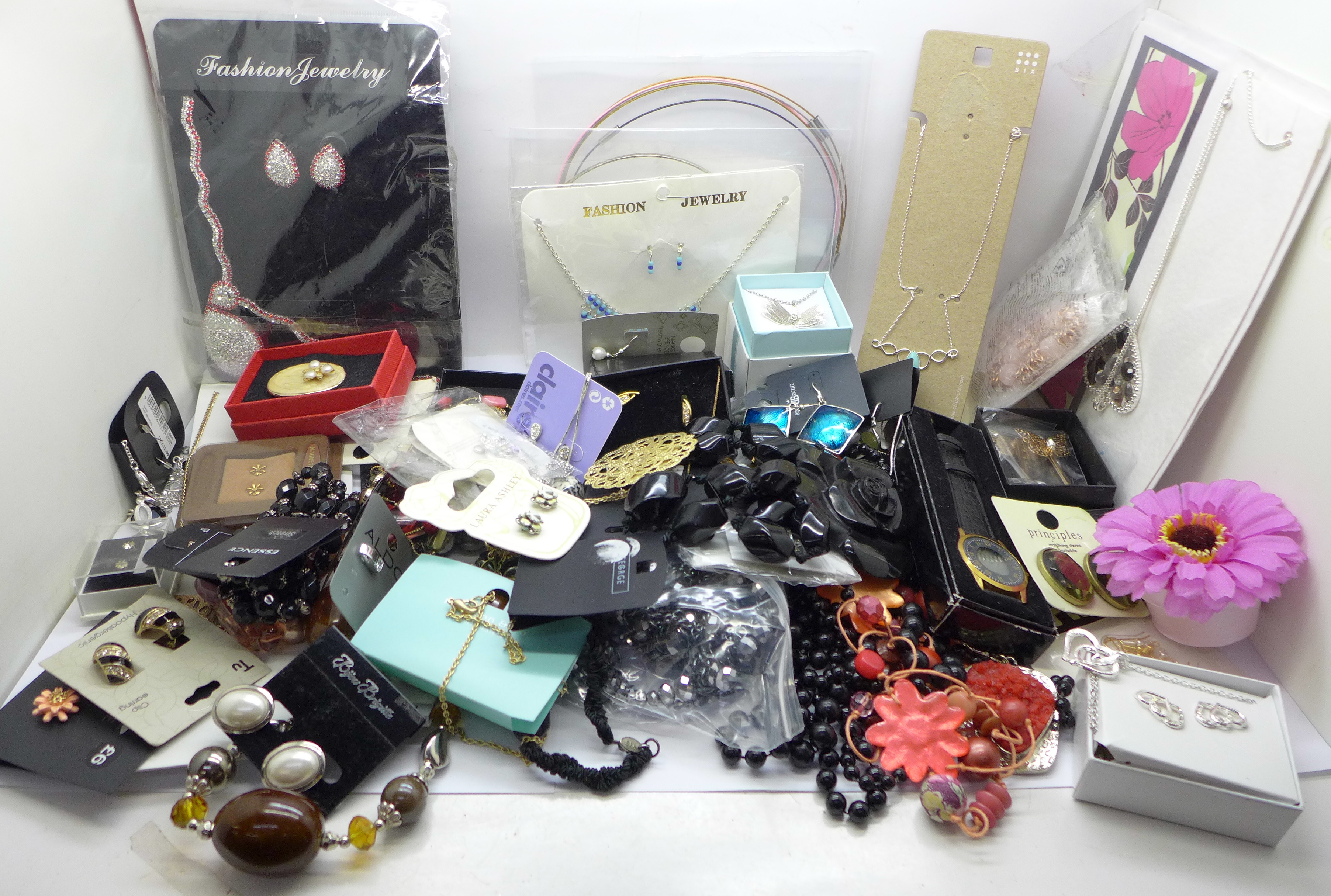 A quantity of packaged and unused jewellery