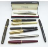 A collection of nine fountain pens;- four with 14ct gold nibs, gold plated Sheaffer, two Parker, one