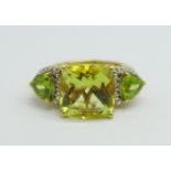 A silver gilt, green quartz and peridot ring with diamond accents, O