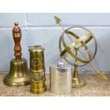 A brass hand bell, a small miner's lamp, an armillary and a pewter spirit flask