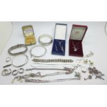 Silver jewellery including three silver bangles, three bracelets, chains, etc., (largest bangle