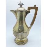 A silver jug with lid, 352g, 18cm