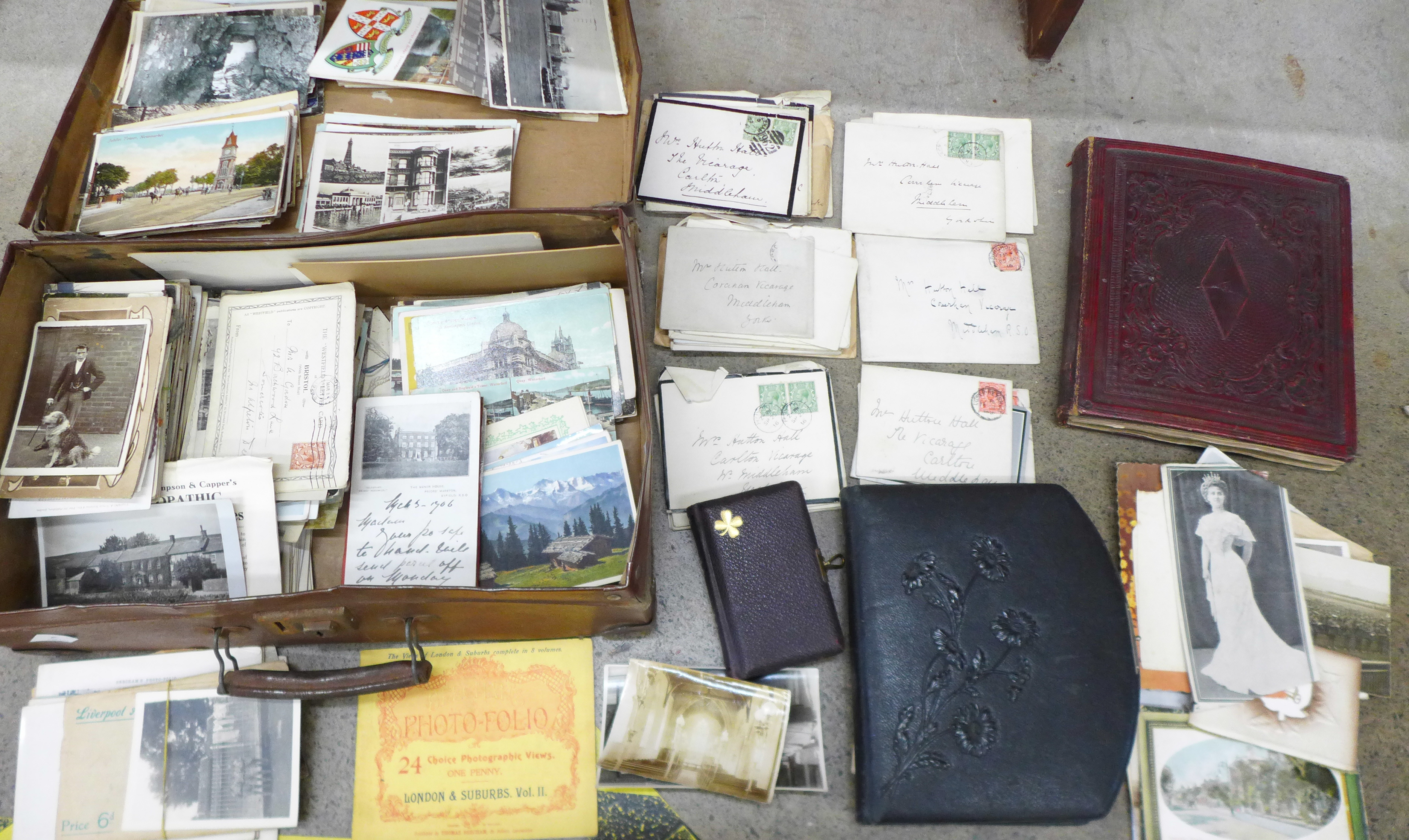 A suitcase containing approximately 250 postcards, early 20th Century postal history including WWI