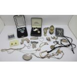 A collection of silver jewellery including a bracelet, two lockets, two brooches with applied
