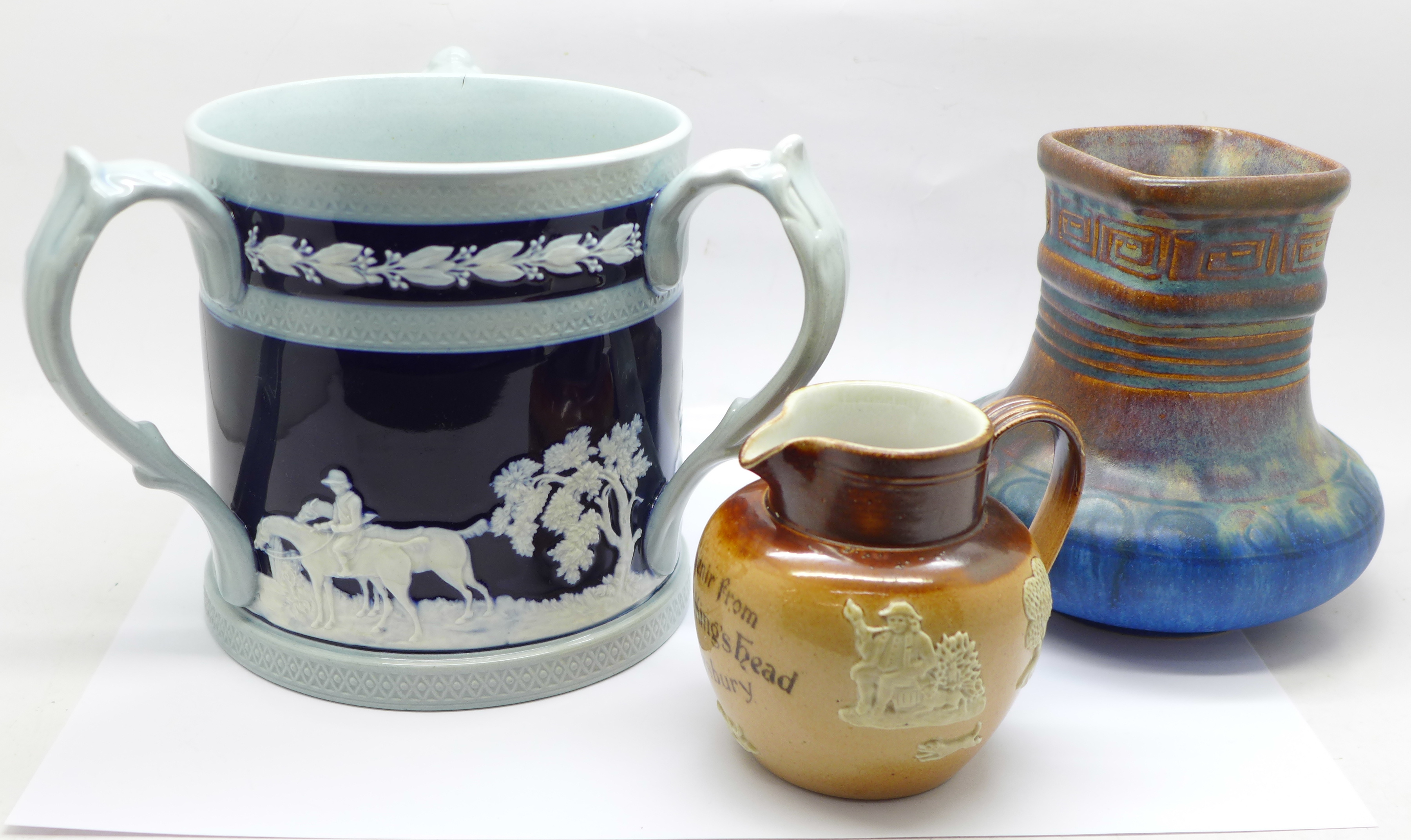 A Danesby Ware Bourne Denby vase, a Royal Doulton relief moulded jug and a Copeland Late Spode