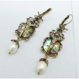 A pair of scarab beetle earrings with pearl drops