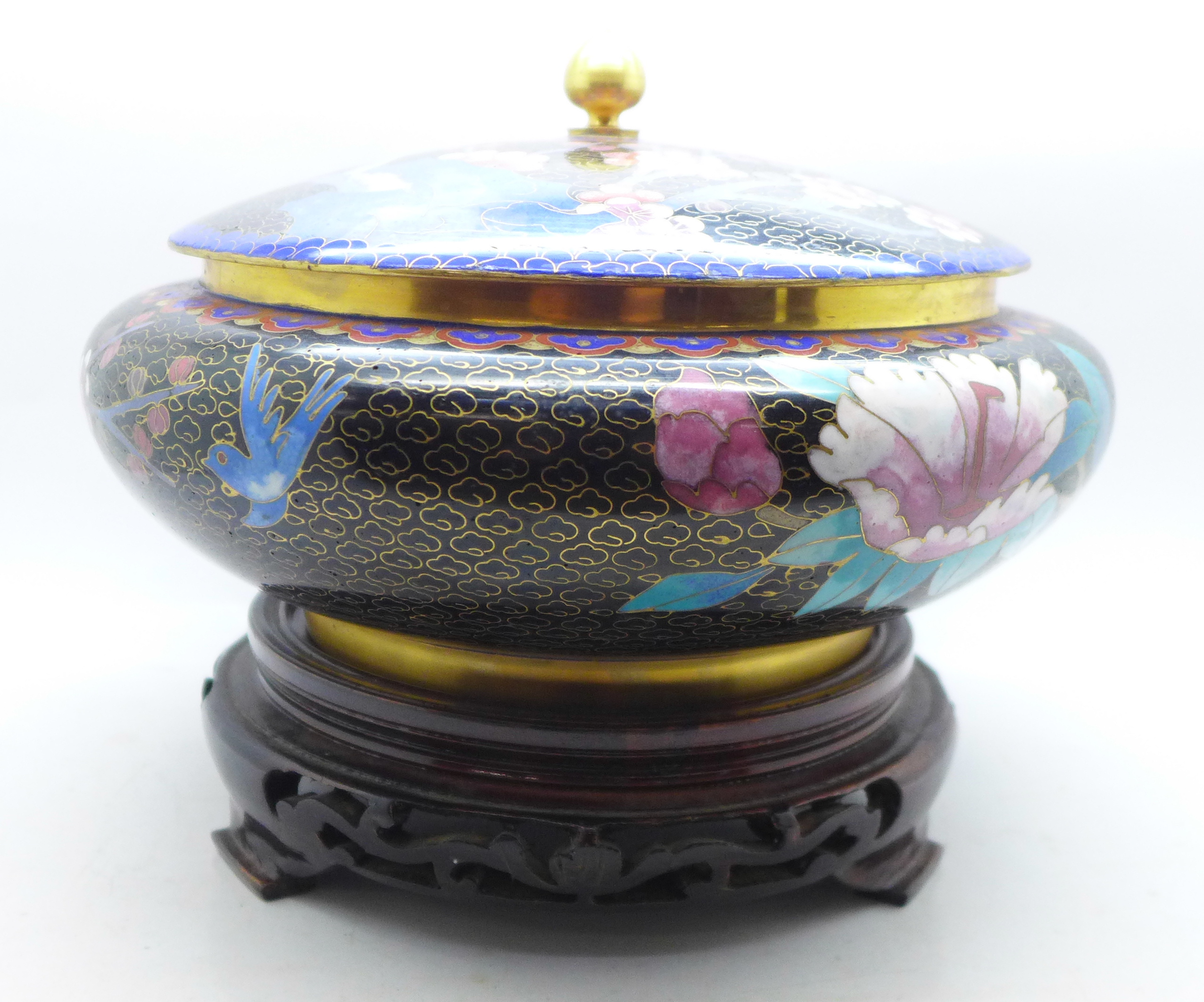 A cloisonne lidded pot decorated with cherry or prunus blossom and birds on a wooden stand, 23cm - Image 2 of 5