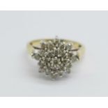 A 9ct gold, diamond cluster ring, 1.00carat diamond weight marked in the shank, 5g, S